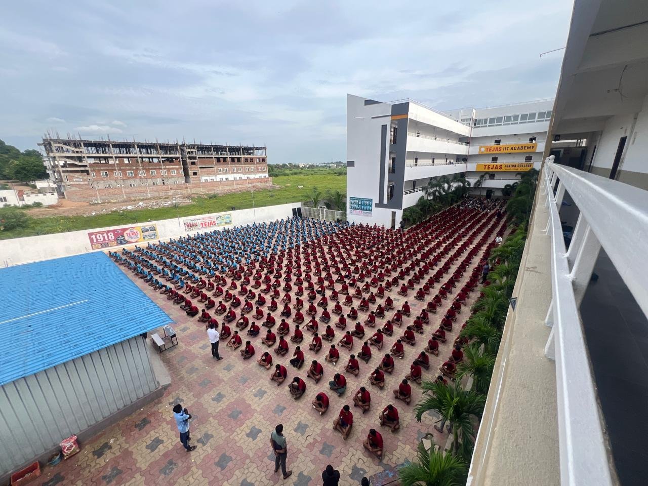 Tejas students in formation on campus grounds